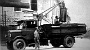 1930, operazione di svuotatura di un pozzetto